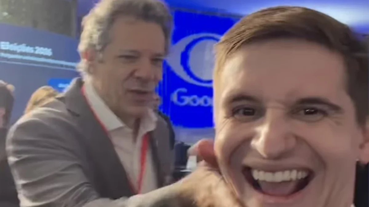 Haddad dá tapinha no rosto de Pavanato nos bastidores de debate na Band